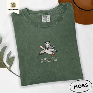Moss Situations Quote Raccoon and Goose Embroidered T-Shirt
