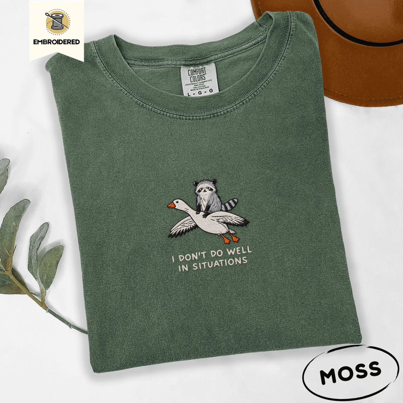 Moss Situations Quote Raccoon and Goose Embroidered T-Shirt