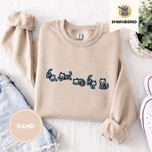Sand Skeleton Cats Embroidered Sweatshirt