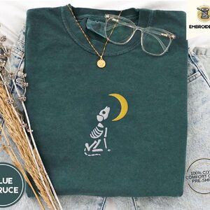 Blue Spruce Skeleton Dog Moon Embroidered T-Shirt
