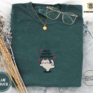 Blue Spruce Slay Serve Survive Cat Embroidered T-Shirt