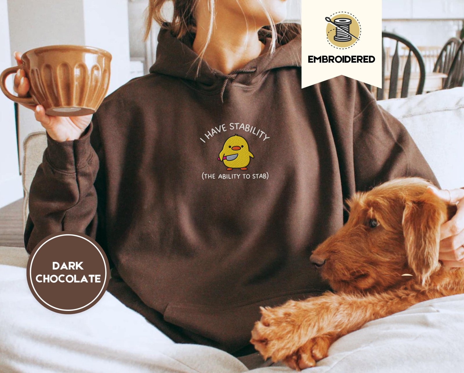 Person wearing a dark chocolate Stability Duck Embroidered Hoodie