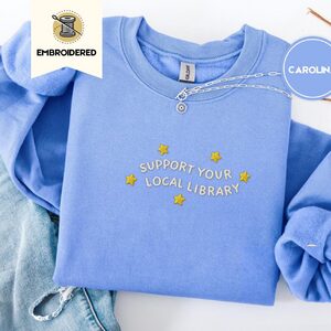 Carolina Blue Support Your Local Library Embroidered Sweatshirt