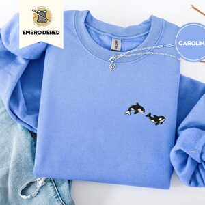 Carolina Blue Swimming Orcas Embroidered Sweatshirt